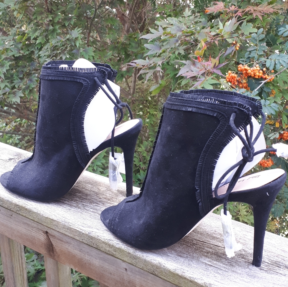 Call it spring open toe boot, sandal!